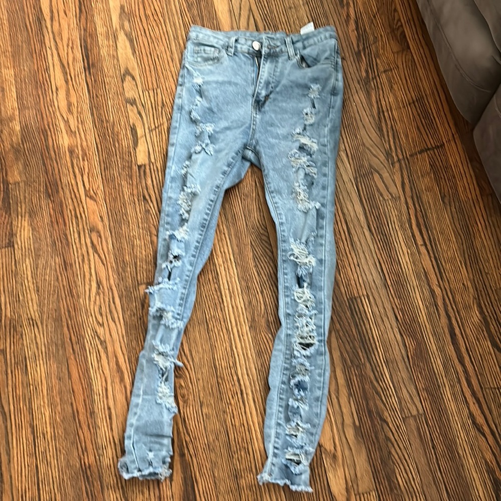light blue ripped jeans